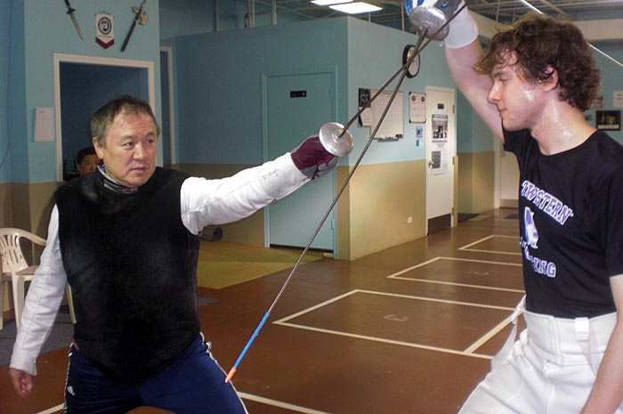 Coach demonstrating blade technique